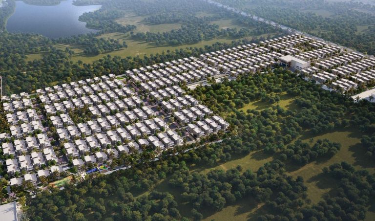 Aerial view of Sansa County township with greenery, villas, and lake in Patancheru.