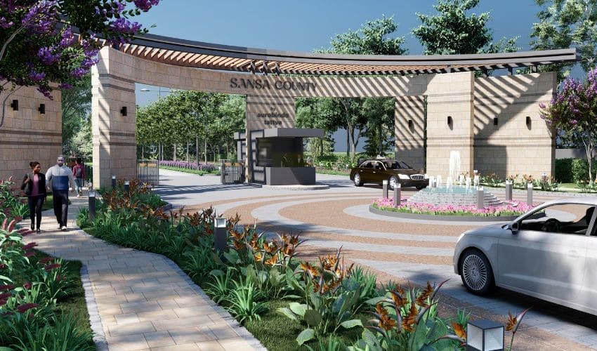 Entrance gate of Sansa County township at Patancheru with lush landscaping.