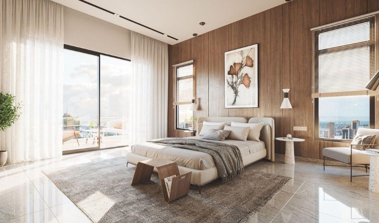Modern corner flat living room showing two sided windows and abundant natural light.