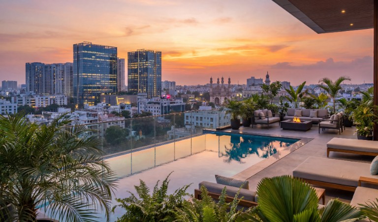 Private plunge pool balcony sky villa Hyderabad panoramic city skyline views ultra-luxury vertical mansion sunset